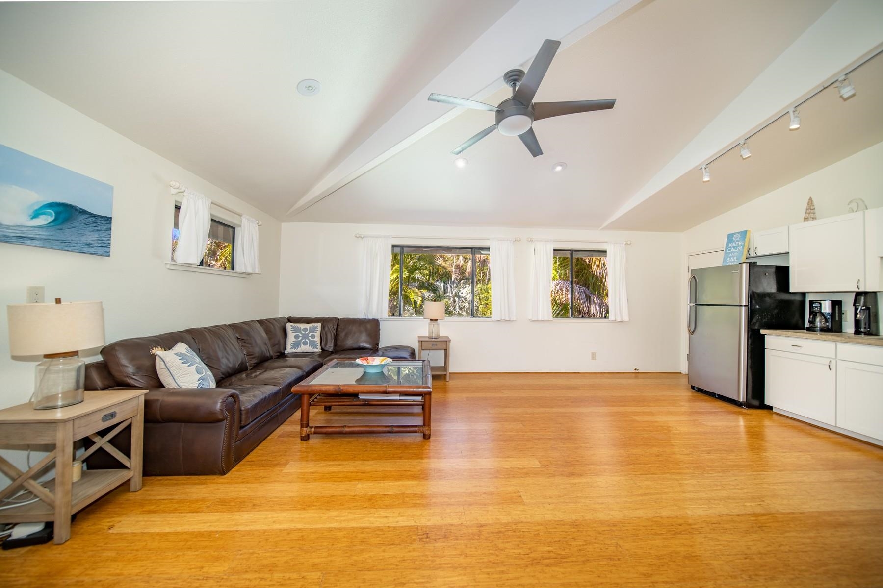 590 Stable Road, Unit C & D Paia, HI 96779 - Photo 12 of 30 a living room with furniture and kitchen view