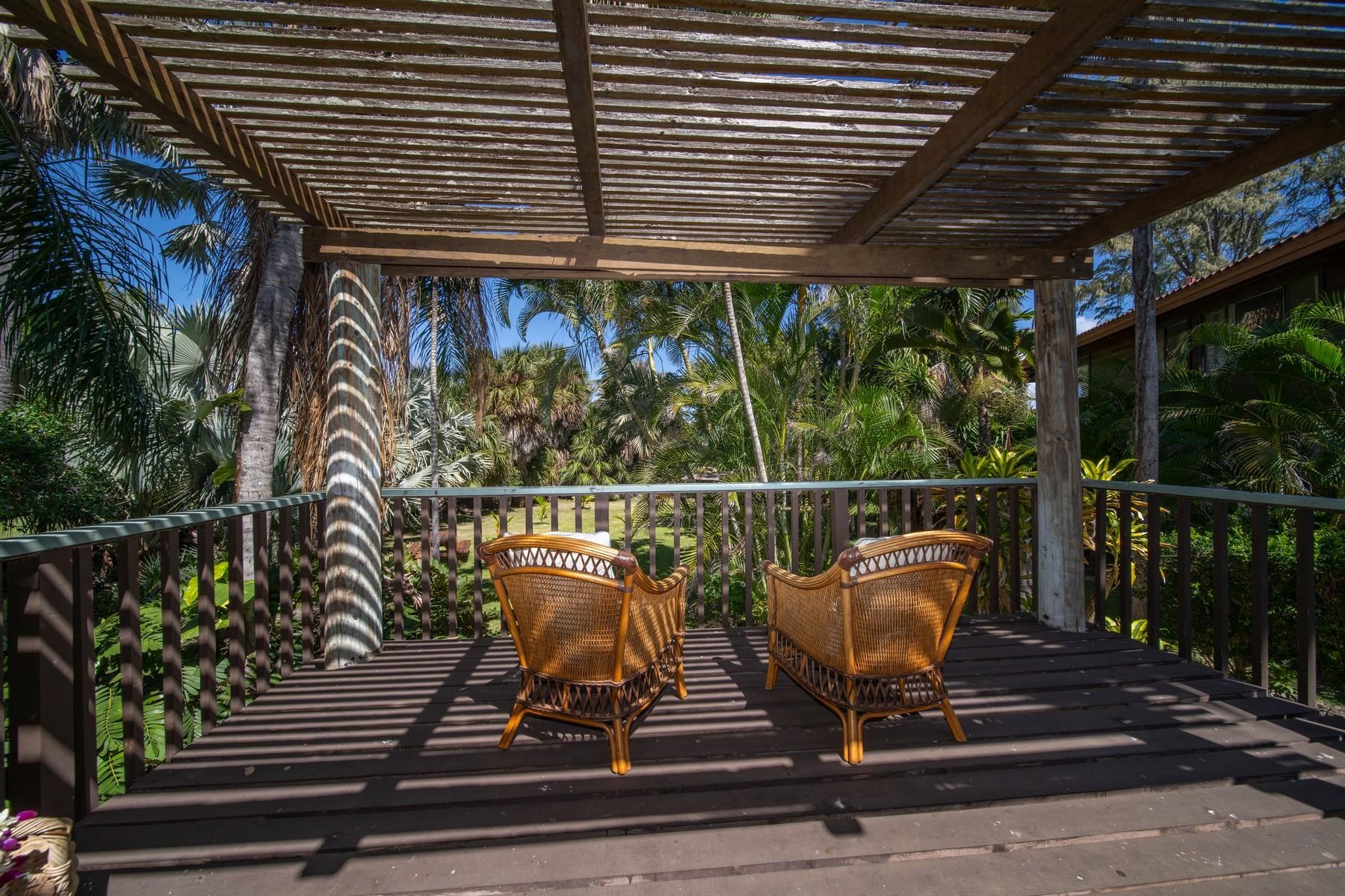 590 Stable Road, Unit C & D Paia, HI 96779 - Photo 22 of 30 a view of a balcony with furniture