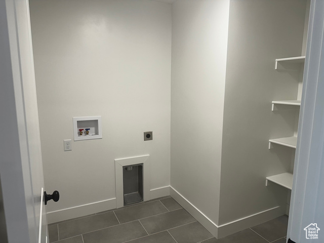 22 South Starlight Lane Mapleton, UT 84664 - Photo 11 of 17 Laundry area with electric dryer hookup, hookup for a washing machine, and dark tile patterned flooring
