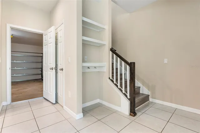 a view of a hallway with closet