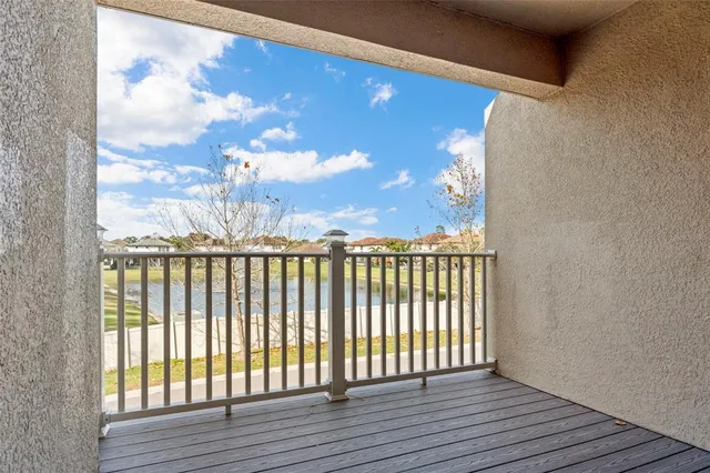 a view of balcony with furniture