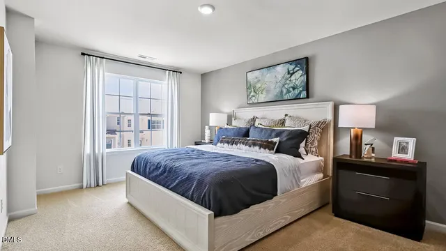 a bed room with a bed and a night stand