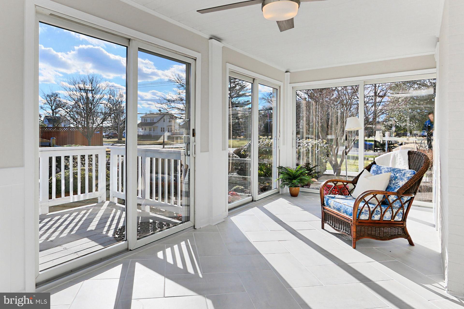 9401 Ox Road Lorton, VA 22079 - Photo 13 of 51 Enjoy walls of glass doors & gorgeous new tile