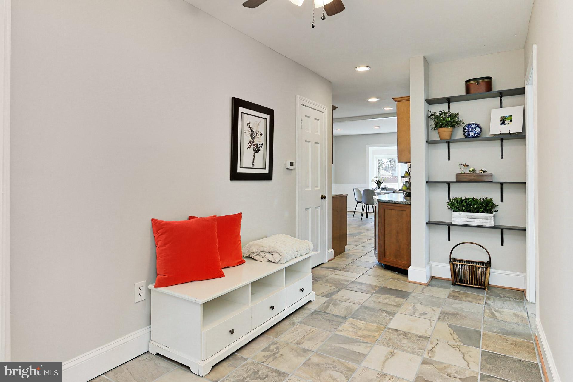 9401 Ox Road Lorton, VA 22079 - Photo 15 of 51 Hall w/ shelving, ceiling fan, tile floor