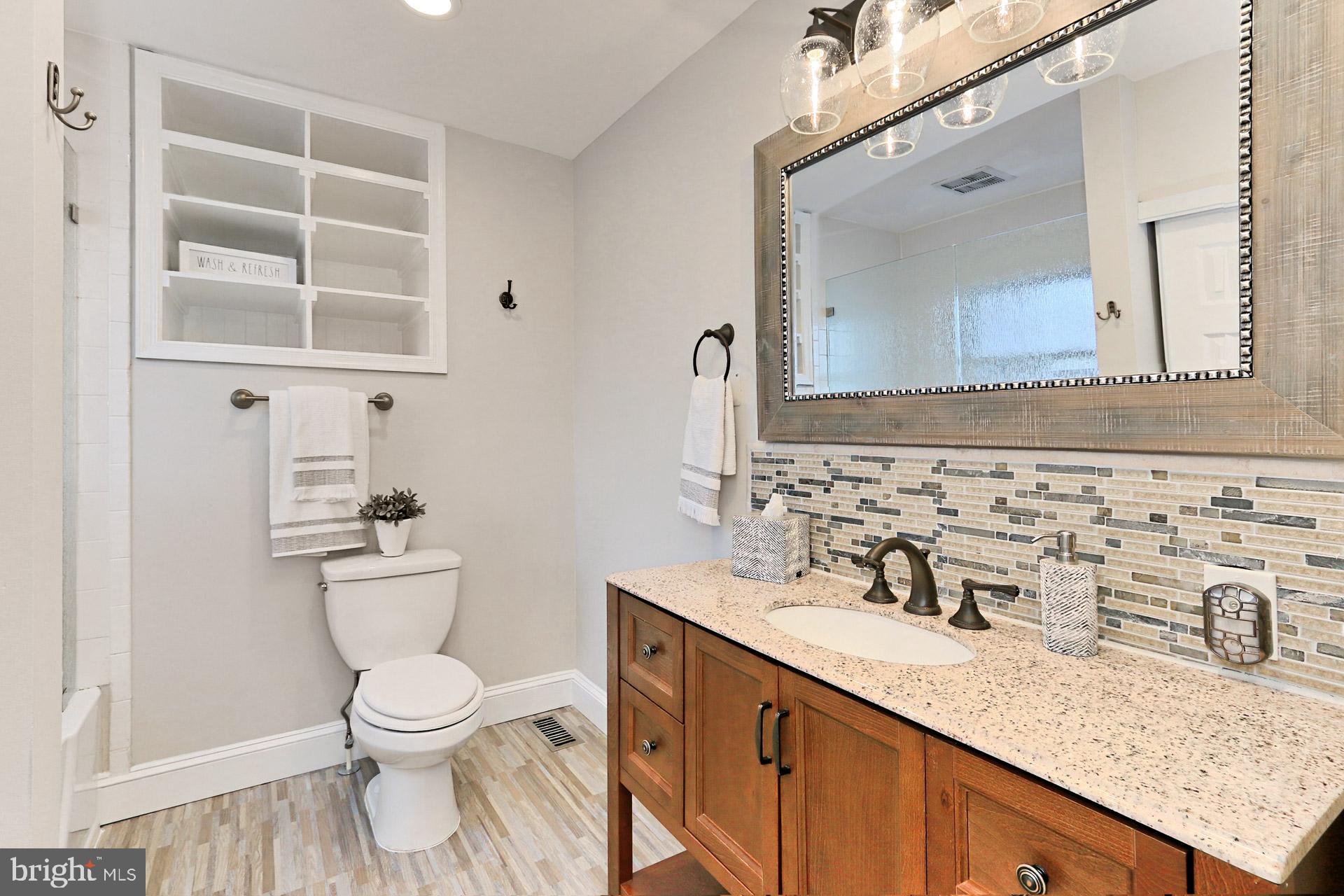 9401 Ox Road Lorton, VA 22079 - Photo 17 of 51 Updated main bathroom