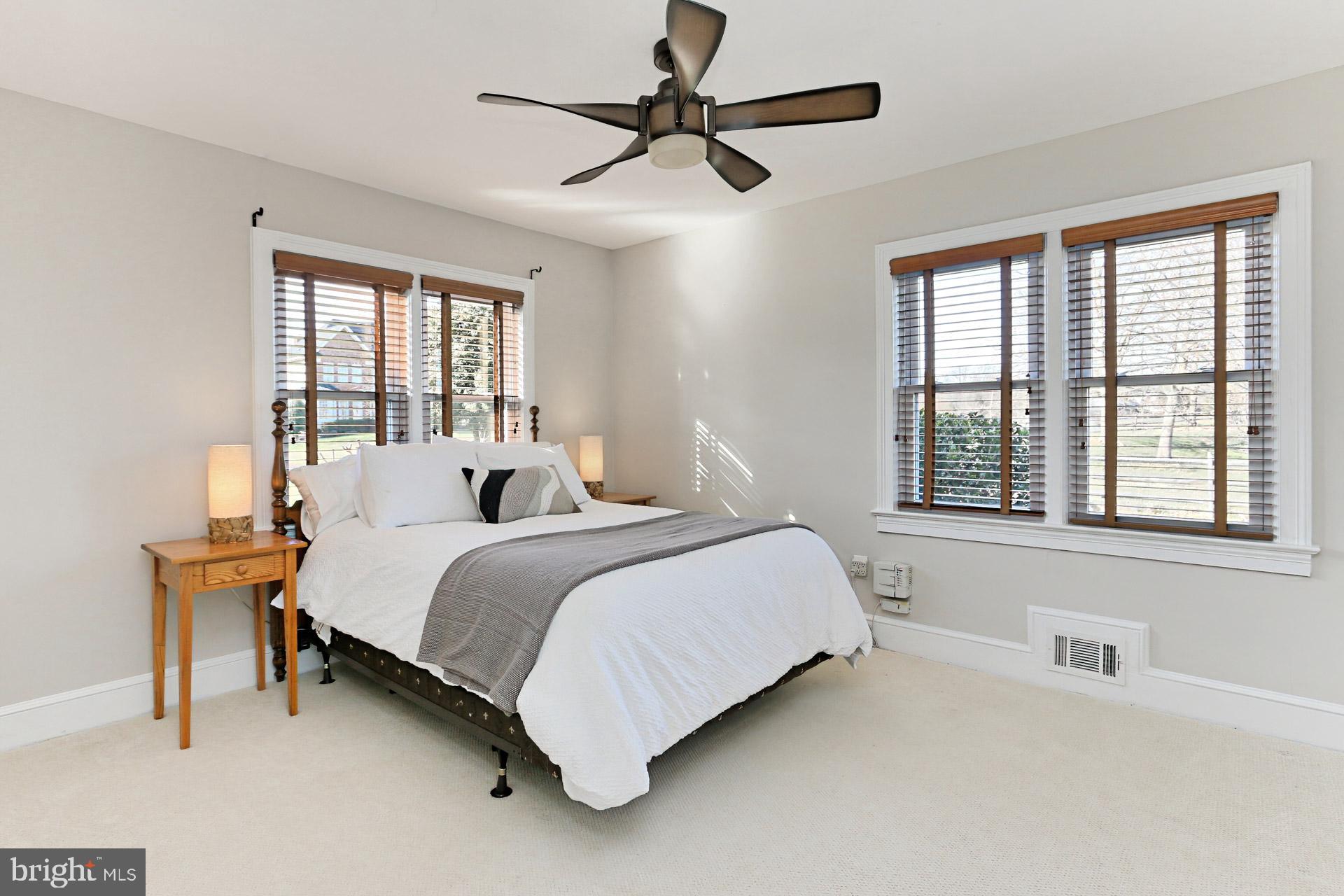 9401 Ox Road Lorton, VA 22079 - Photo 18 of 51 2nd bedroom with wood blinds, closet & ceiling fan