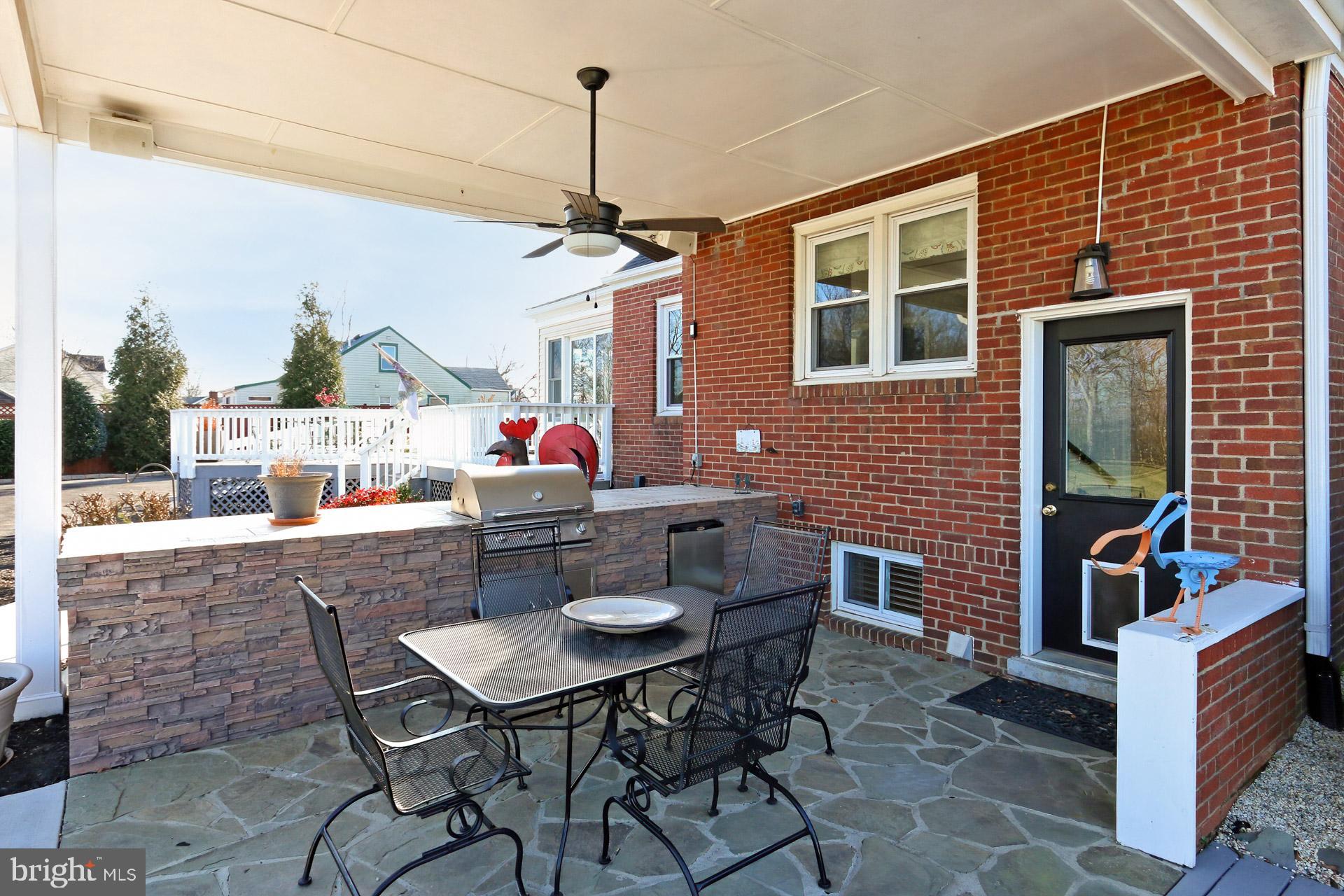 9401 Ox Road Lorton, VA 22079 - Photo 33 of 51 Main house covered patio w/ gas grill & fridge