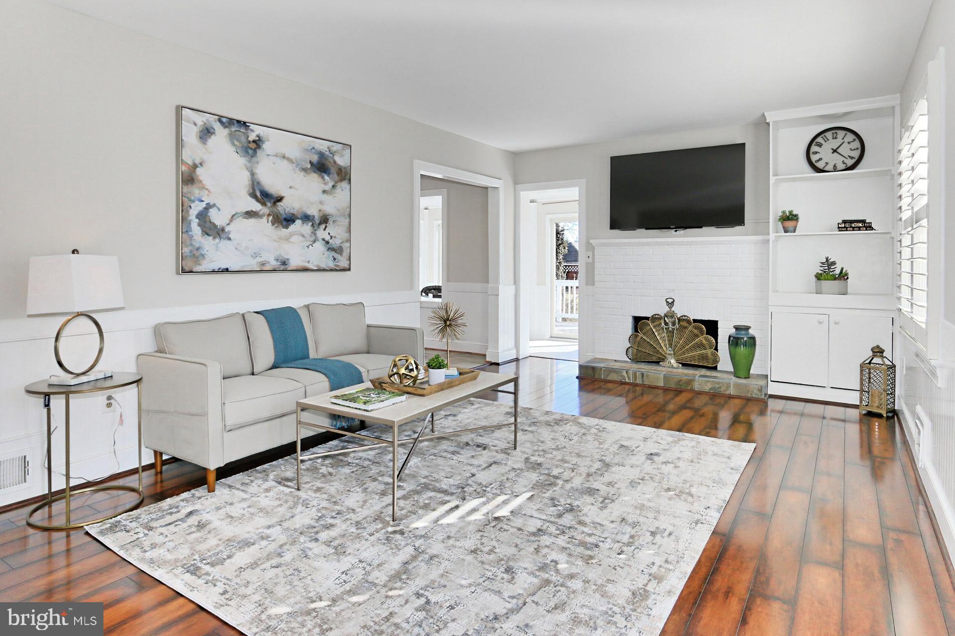 9401 Ox Road Lorton, VA 22079 - Photo 6 of 51 Bright, open living room with fireplace