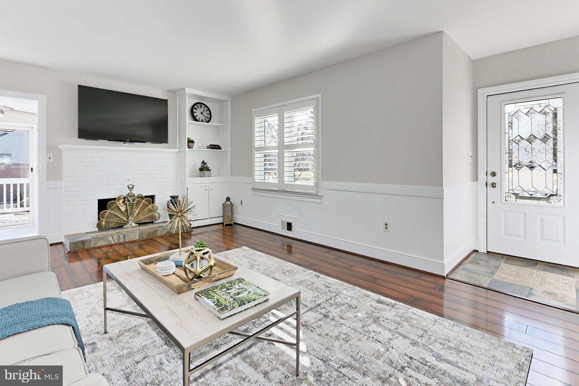 9401 Ox Road Lorton, VA 22079 - Photo 7 of 51 Crisp moldings & window shutters brighten the room