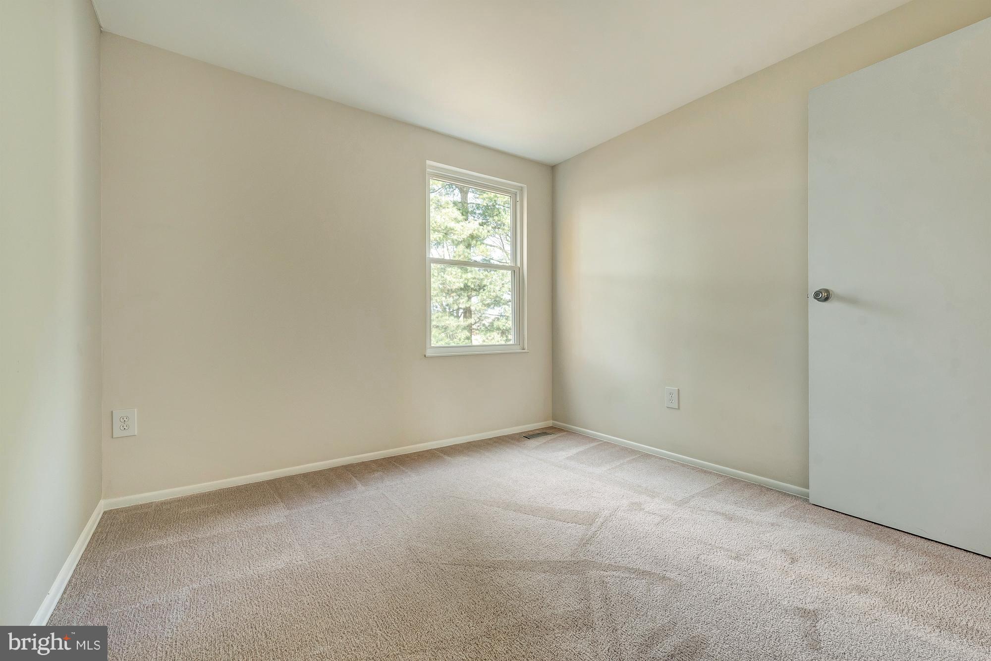 17624 Kohlhoss Road Poolesville, MD 20837 - Photo 23 of 36 a view of an empty room with a window