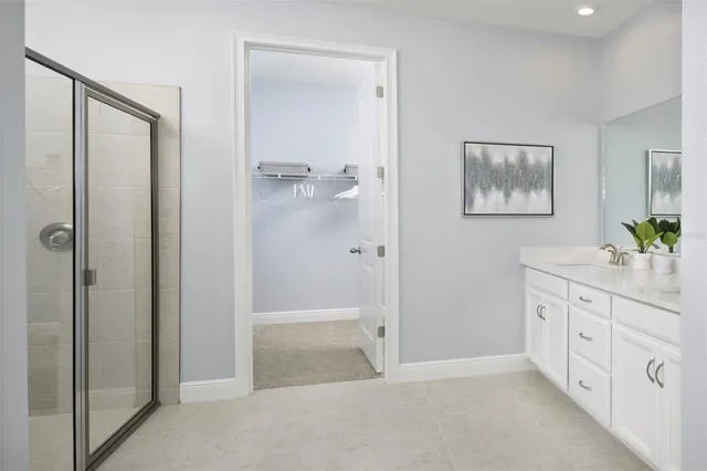 a bed room with a bed and windows