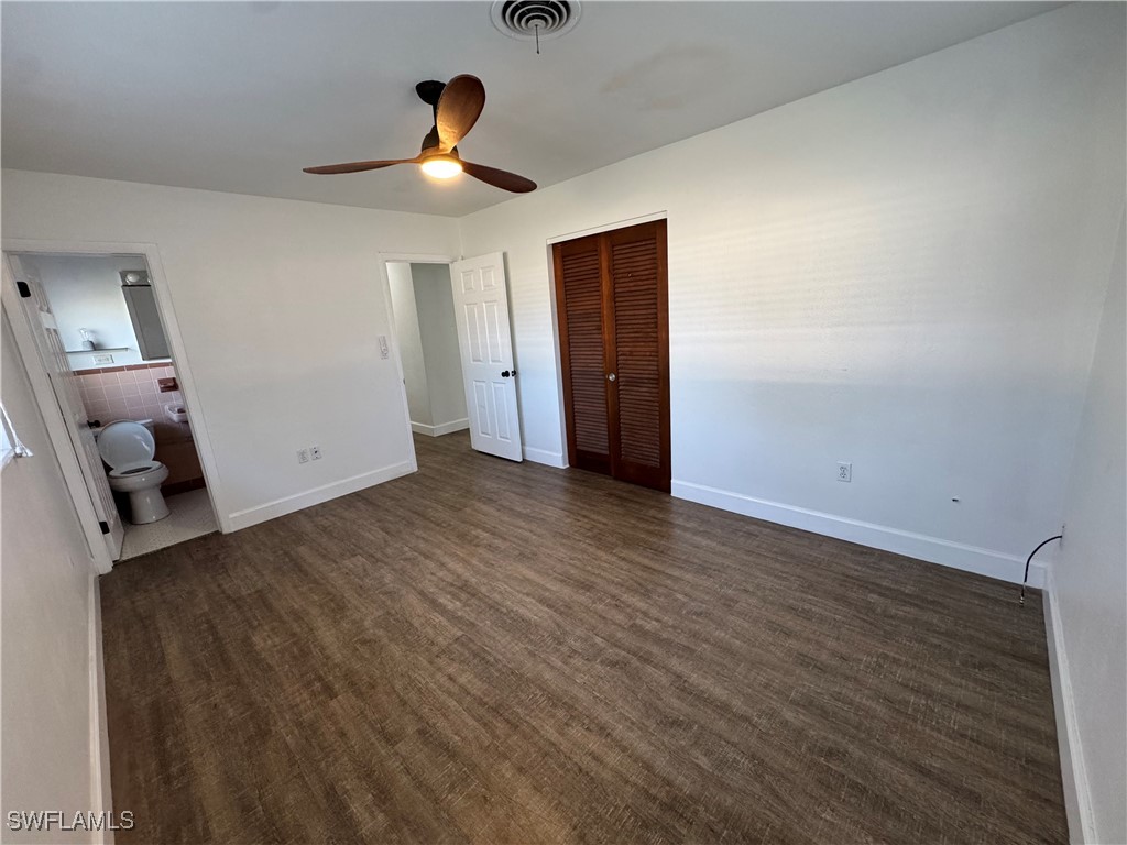 5521 Granada Road Fort Myers, FL 33919 - Photo 17 of 35 a view of empty room with wooden floor