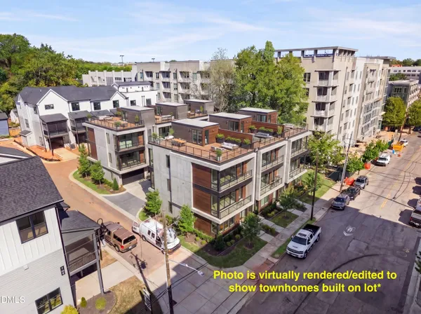 a view of a building with a lot of trees in front of it
