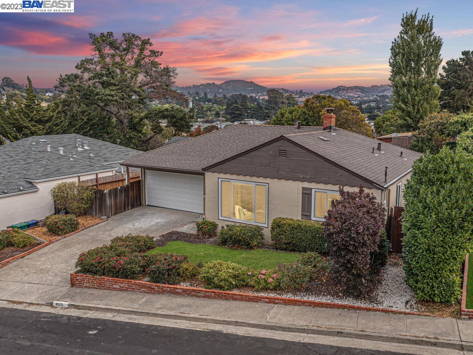 a view of a house with a garden