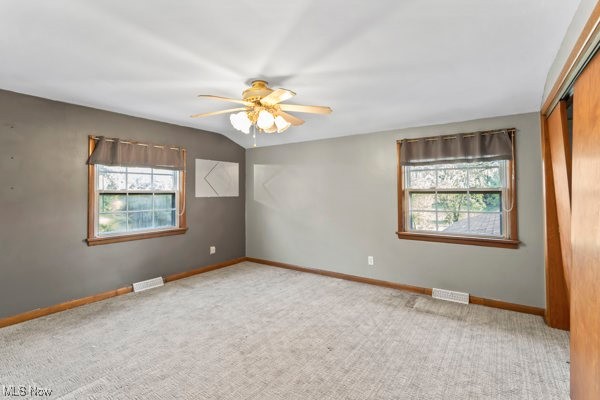 14413 Macklin Road New Springfield, OH 44443 - Photo 47 of 49 Carpeted spare room featuring a ceiling fan and baseboards