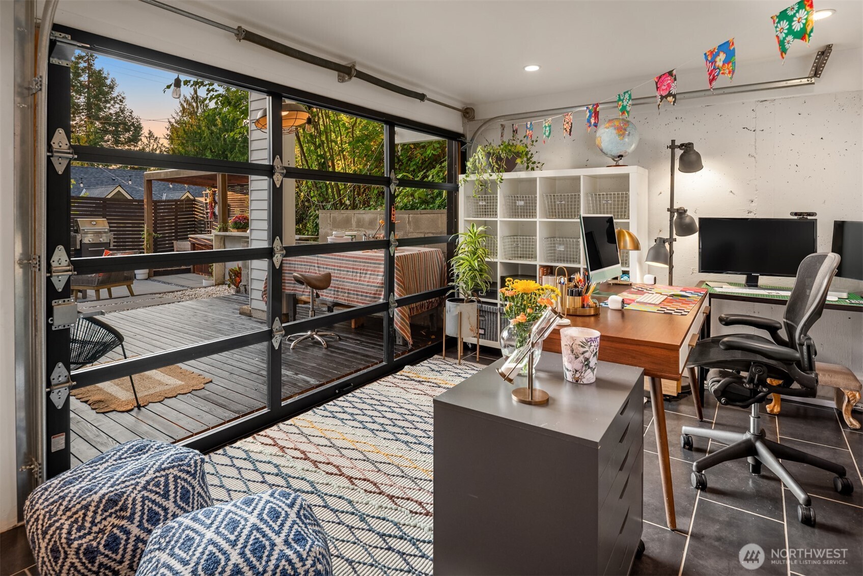 617 33rd Avenue East Seattle, WA 98112 - Photo 22 of 36 a view of a workspace with furniture and floor to ceiling window