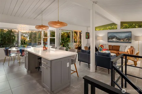 a view of a dining room with furniture window and outside view