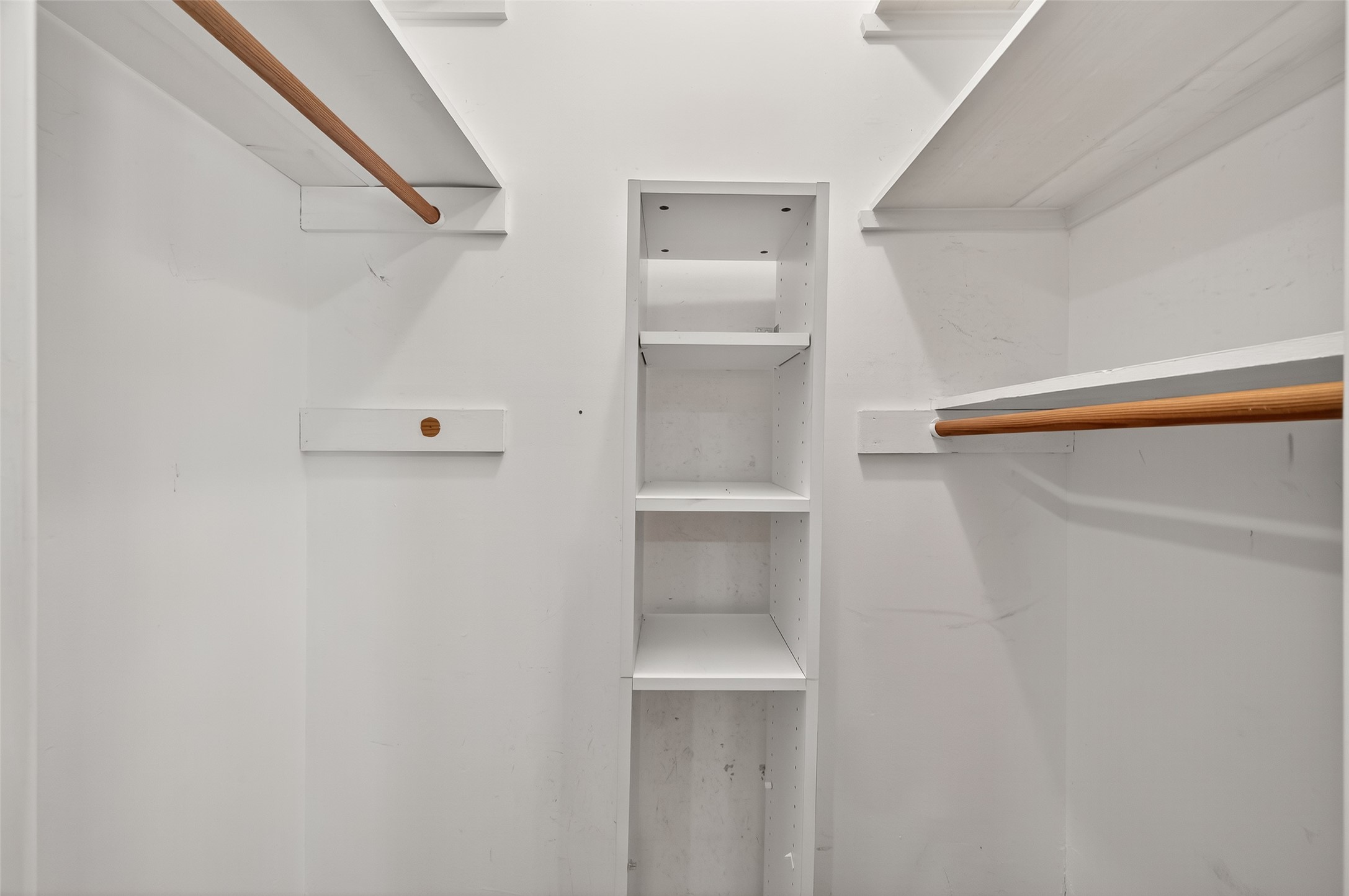 5326 Redstart Street Houston, TX 77096 - Photo 22 of 41 a view of an empty walk in closet