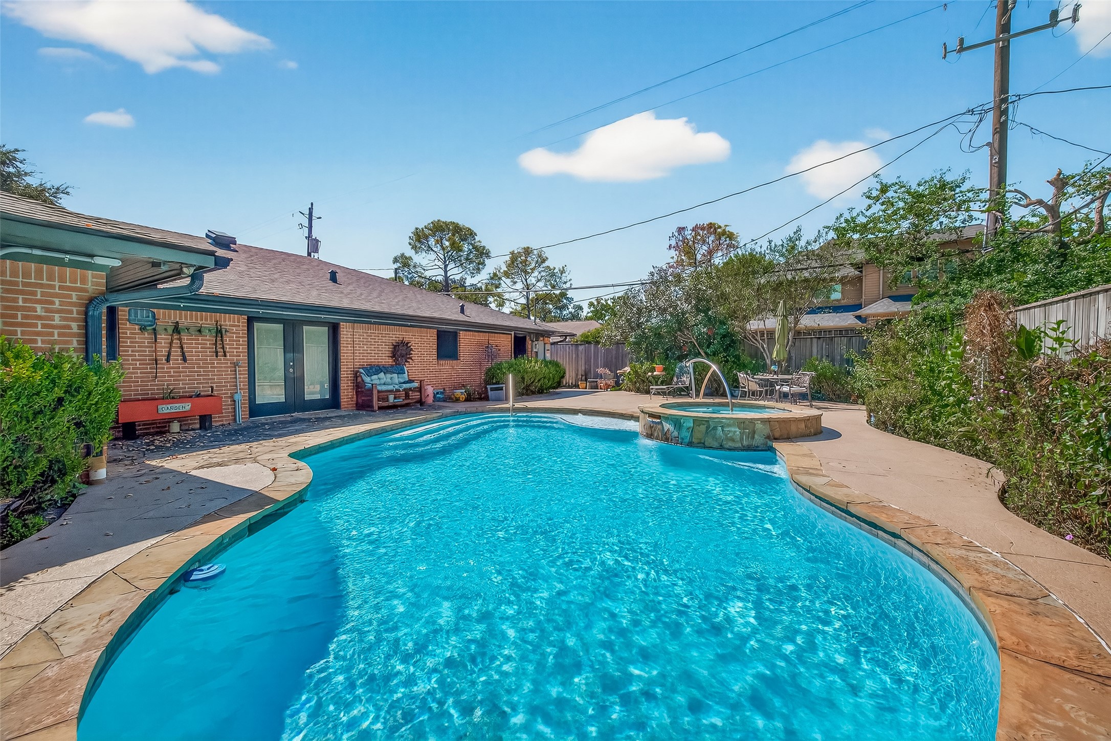 5326 Redstart Street Houston, TX 77096 - Photo 40 of 41 a view of a house with swimming pool