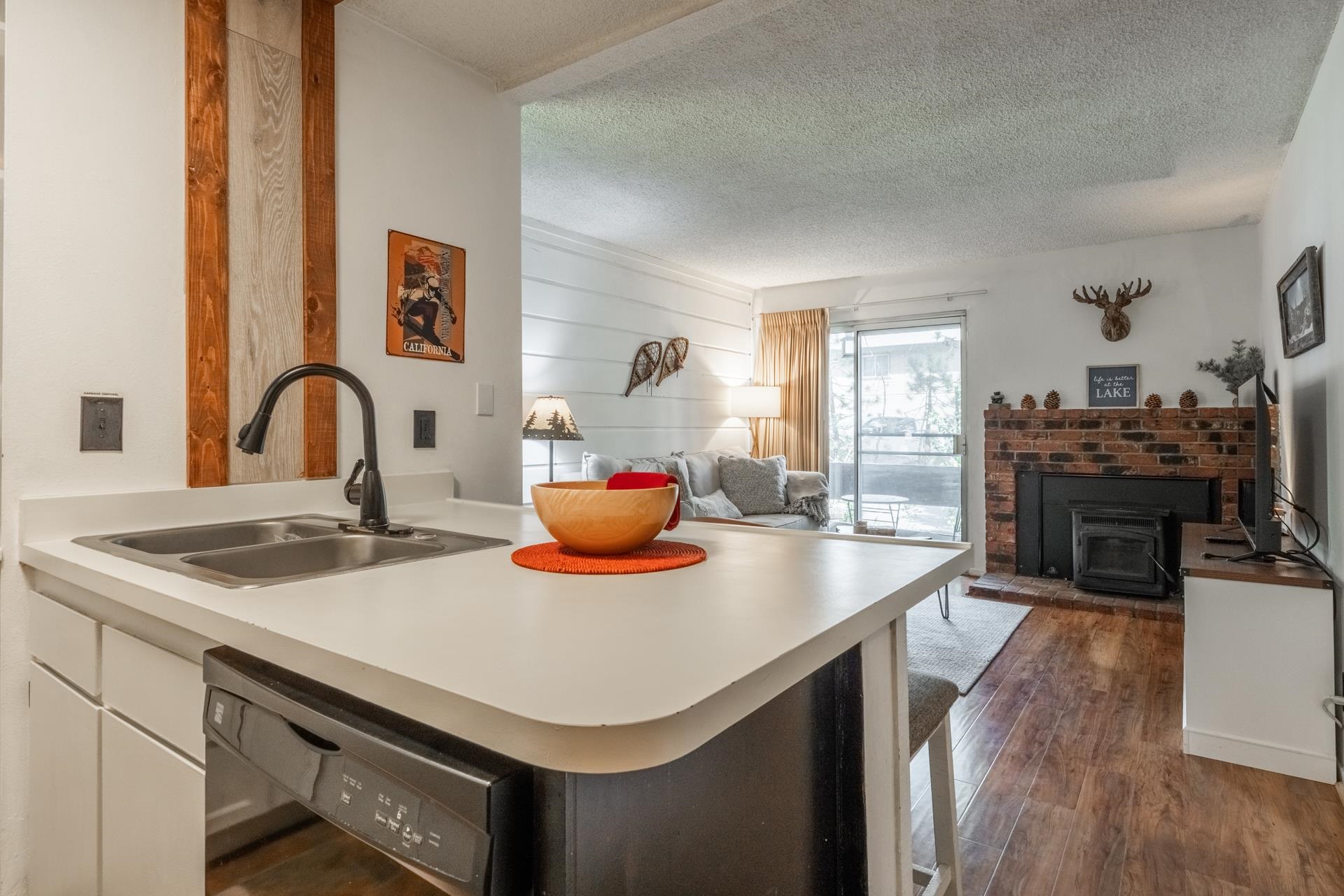 2499 Sierra Nevada Road, Unit R2 Mammoth Lakes, CA 93546 - Photo 8 of 28 a kitchen with a sink and a stove