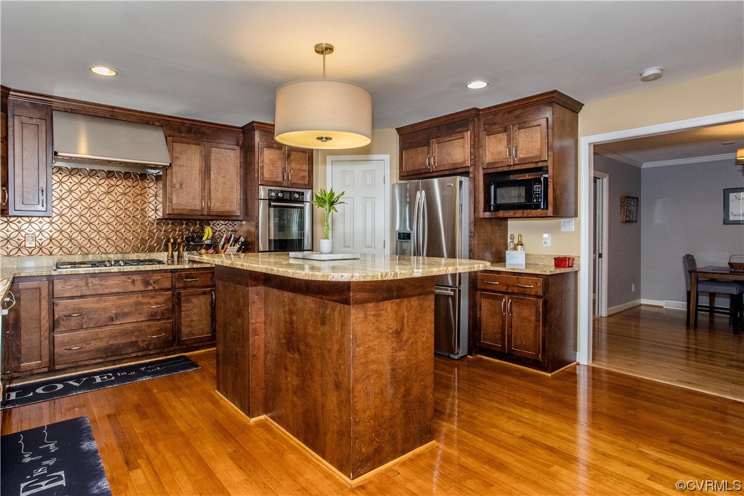 4021 Hidden Valley Road Chester, VA 23831 - Photo 13 of 48 a kitchen with stainless steel appliances a sink stove and refrigerator