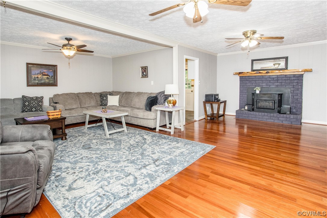 4021 Hidden Valley Road Chester, VA 23831 - Photo 14 of 48 a living room with furniture and a fireplace