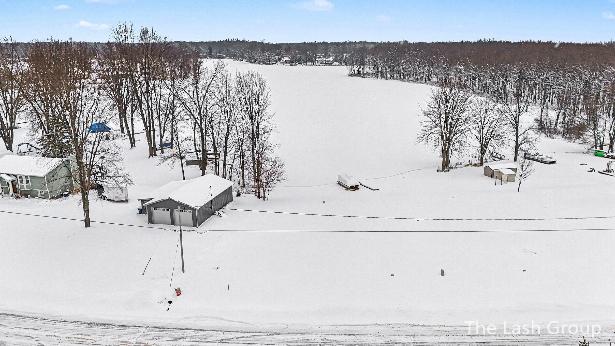 9772 10 Mile Road Northeast Rockford, MI 49341 - Photo 4 of 13 DJI_20260121131611_0018_D