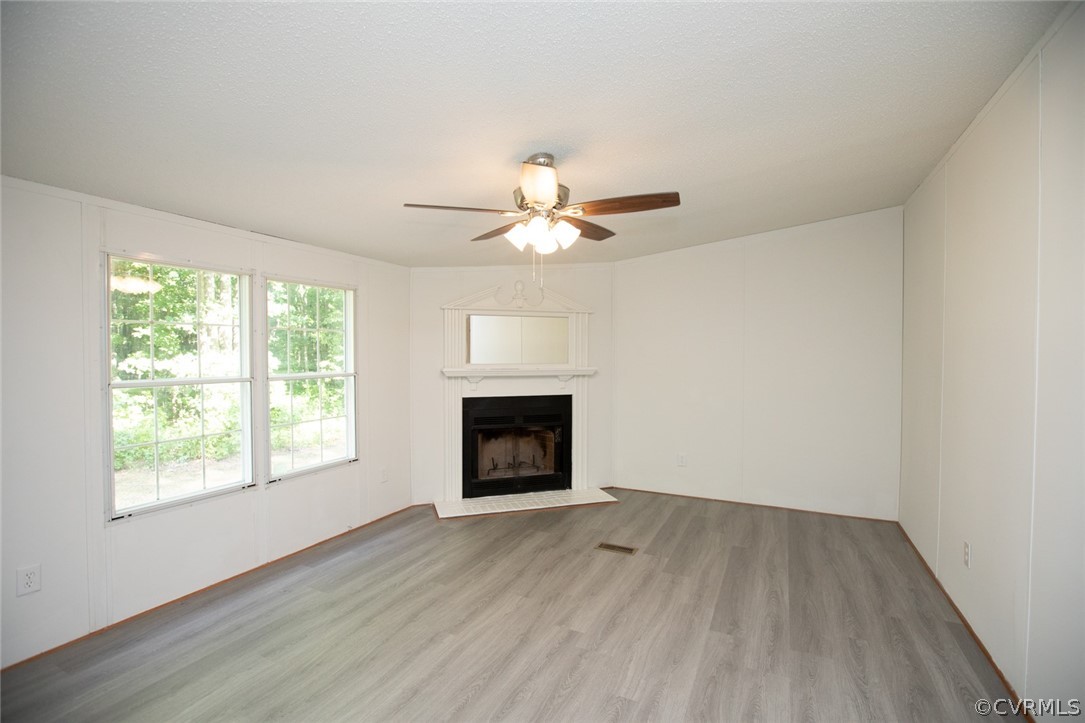 167 Browntown Road Prospect, VA 23960 - Photo 14 of 40 a view of an empty room with a window and fireplace