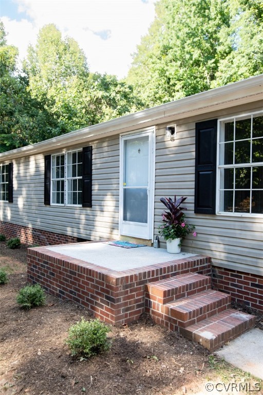 167 Browntown Road Prospect, VA 23960 - Photo 3 of 40 a front view of a house with garden