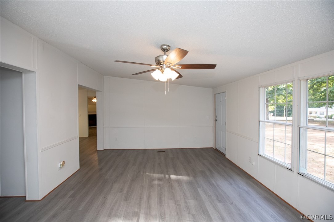 167 Browntown Road Prospect, VA 23960 - Photo 4 of 40 an empty room with wooden floor and windows