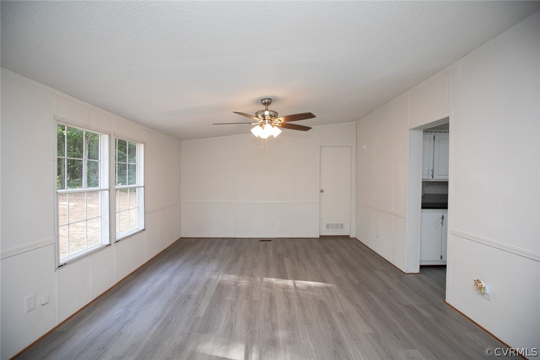 167 Browntown Road Prospect, VA 23960 - Photo 5 of 40 wooden floor in an empty room with a window