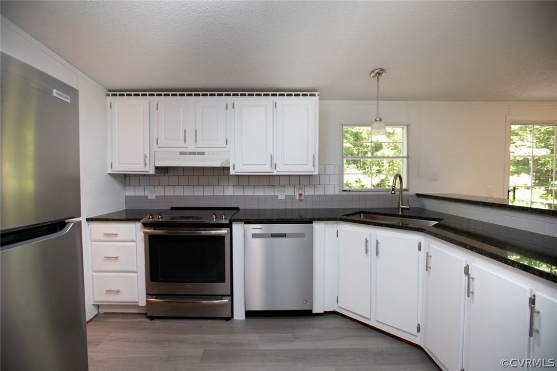 167 Browntown Road Prospect, VA 23960 - Photo 7 of 40 a kitchen with granite countertop white cabinets and a sink