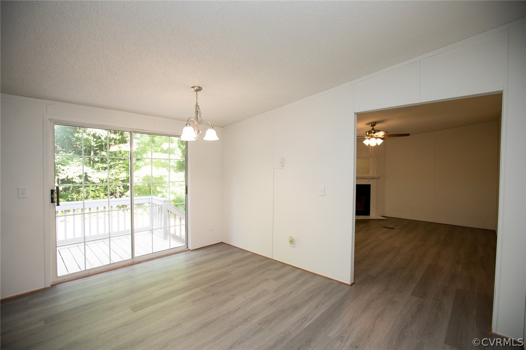 167 Browntown Road Prospect, VA 23960 - Photo 10 of 40 an empty room with wooden floor and windows