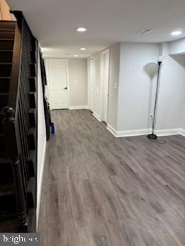 4505 Harcourt Road Baltimore, MD 21214 - Photo 15 of 21 Spacious, modern basement with sleek flooring.