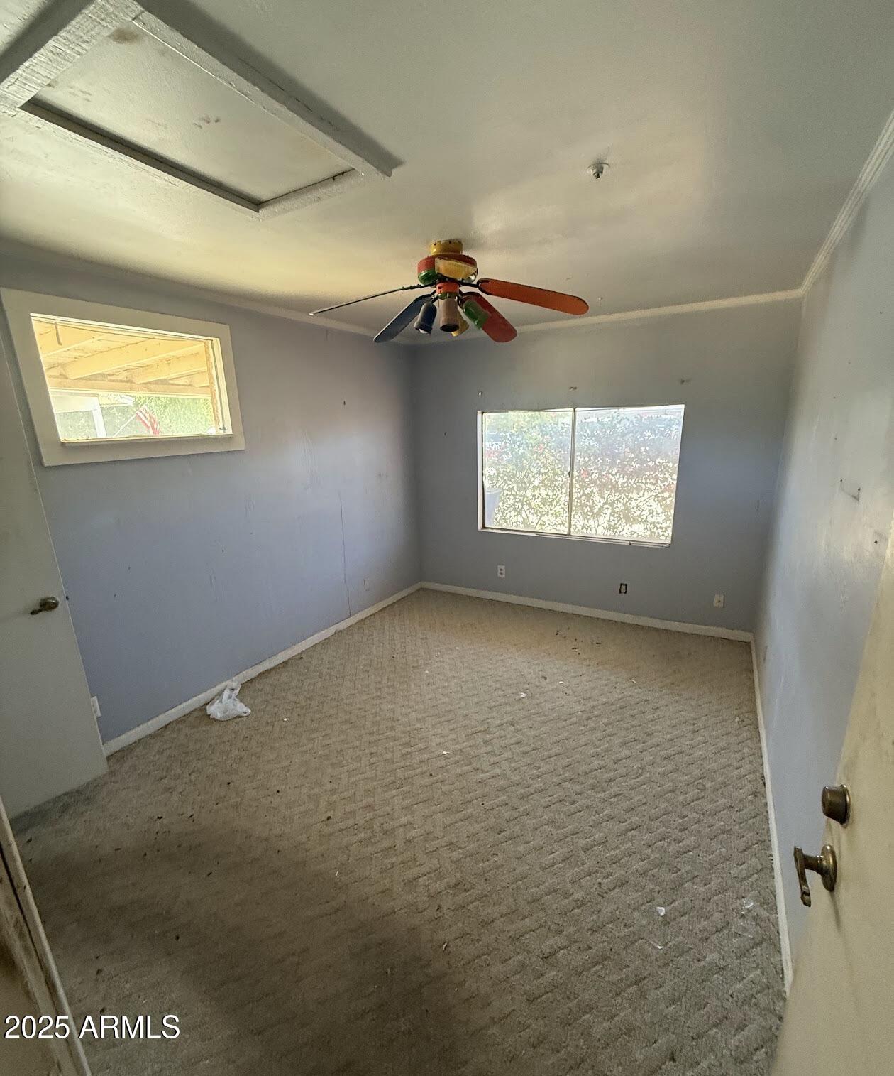 2615 North Yucca Street Chandler, AZ 85224 - Photo 12 of 38 a view of empty room with windows