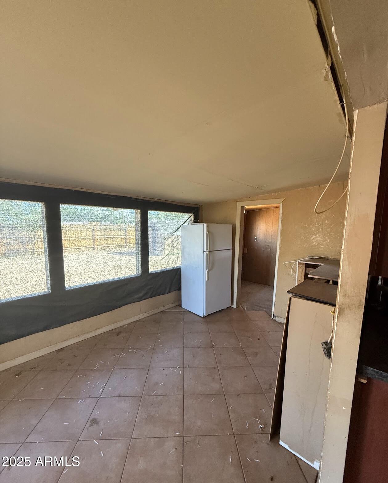 2615 North Yucca Street Chandler, AZ 85224 - Photo 20 of 38 a view of an empty room with a window