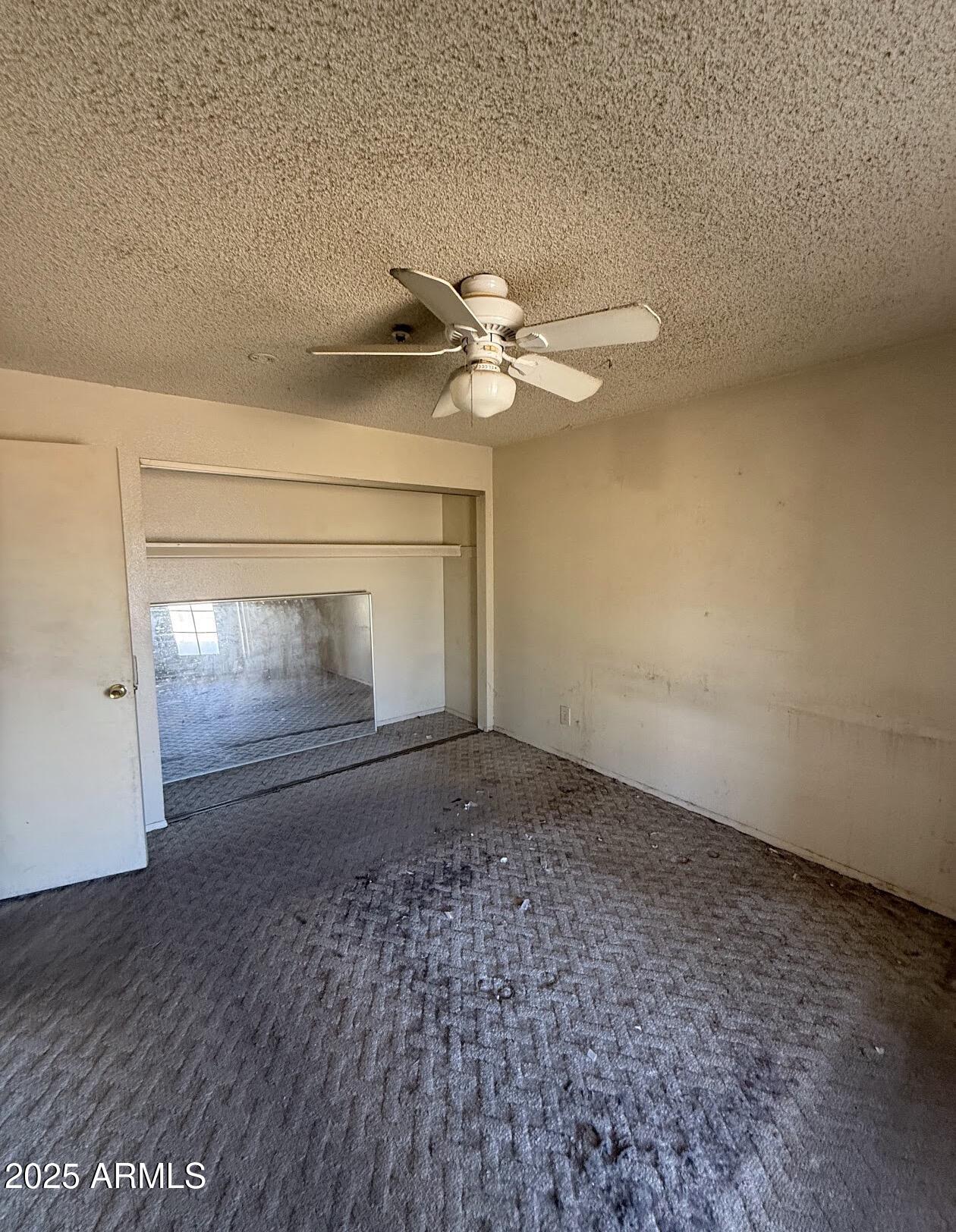 2615 North Yucca Street Chandler, AZ 85224 - Photo 29 of 38 a view of empty room with ceiling fan