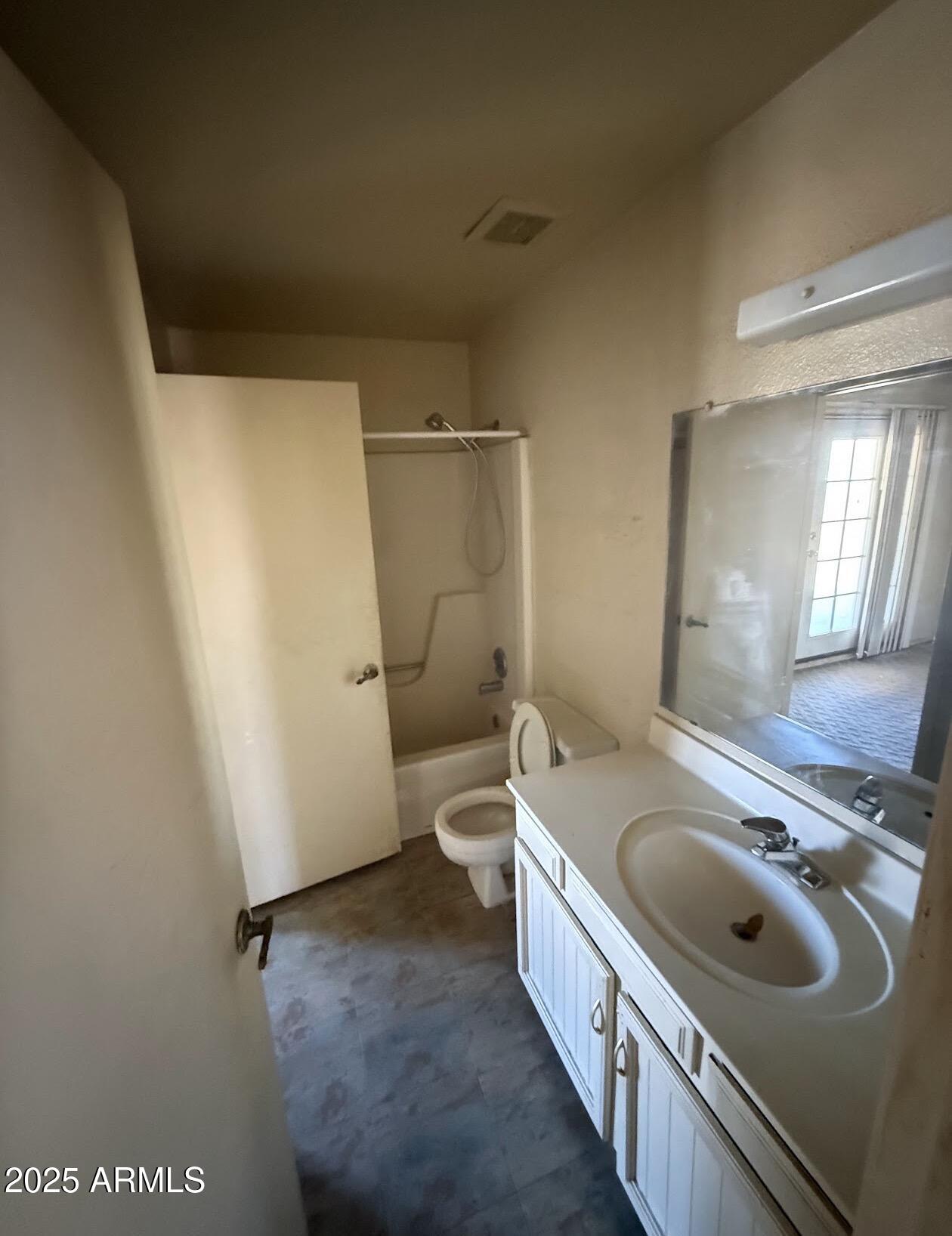 2615 North Yucca Street Chandler, AZ 85224 - Photo 31 of 38 a bathroom with a granite countertop sink toilet and shower