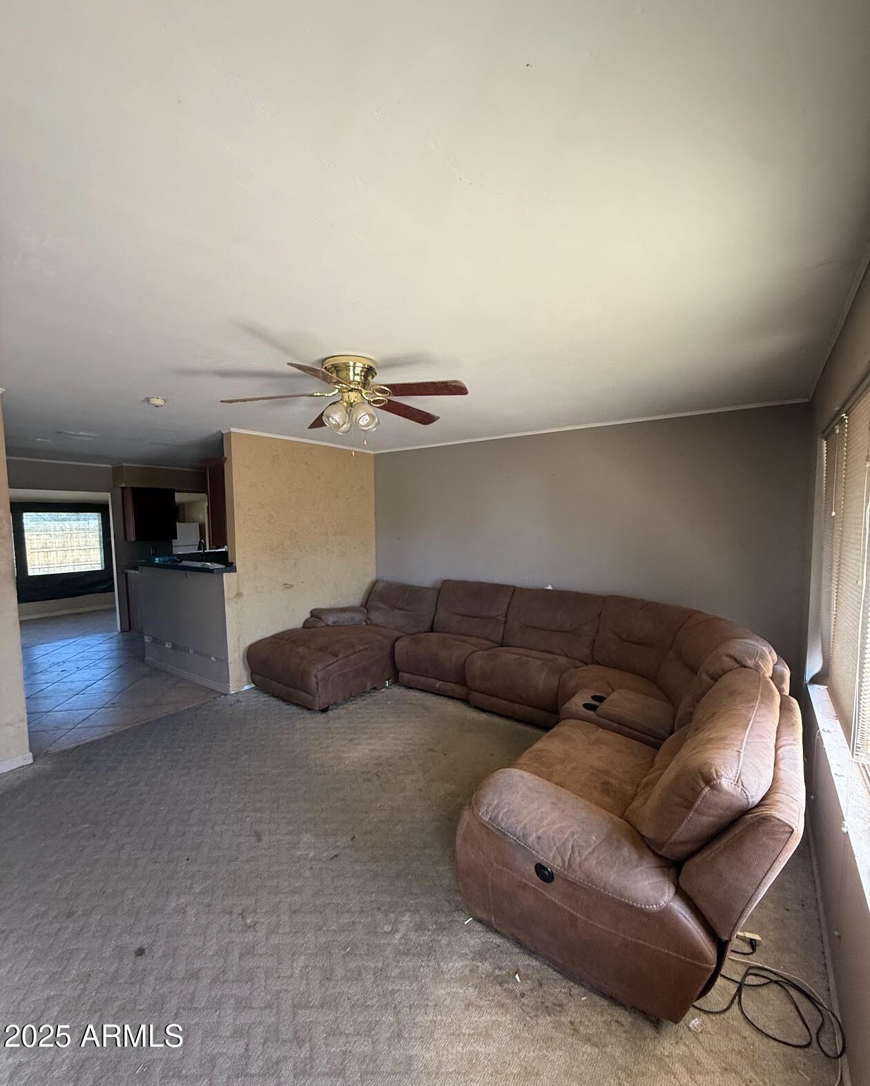 2615 North Yucca Street Chandler, AZ 85224 - Photo 5 of 38 a living room with furniture and kitchen view