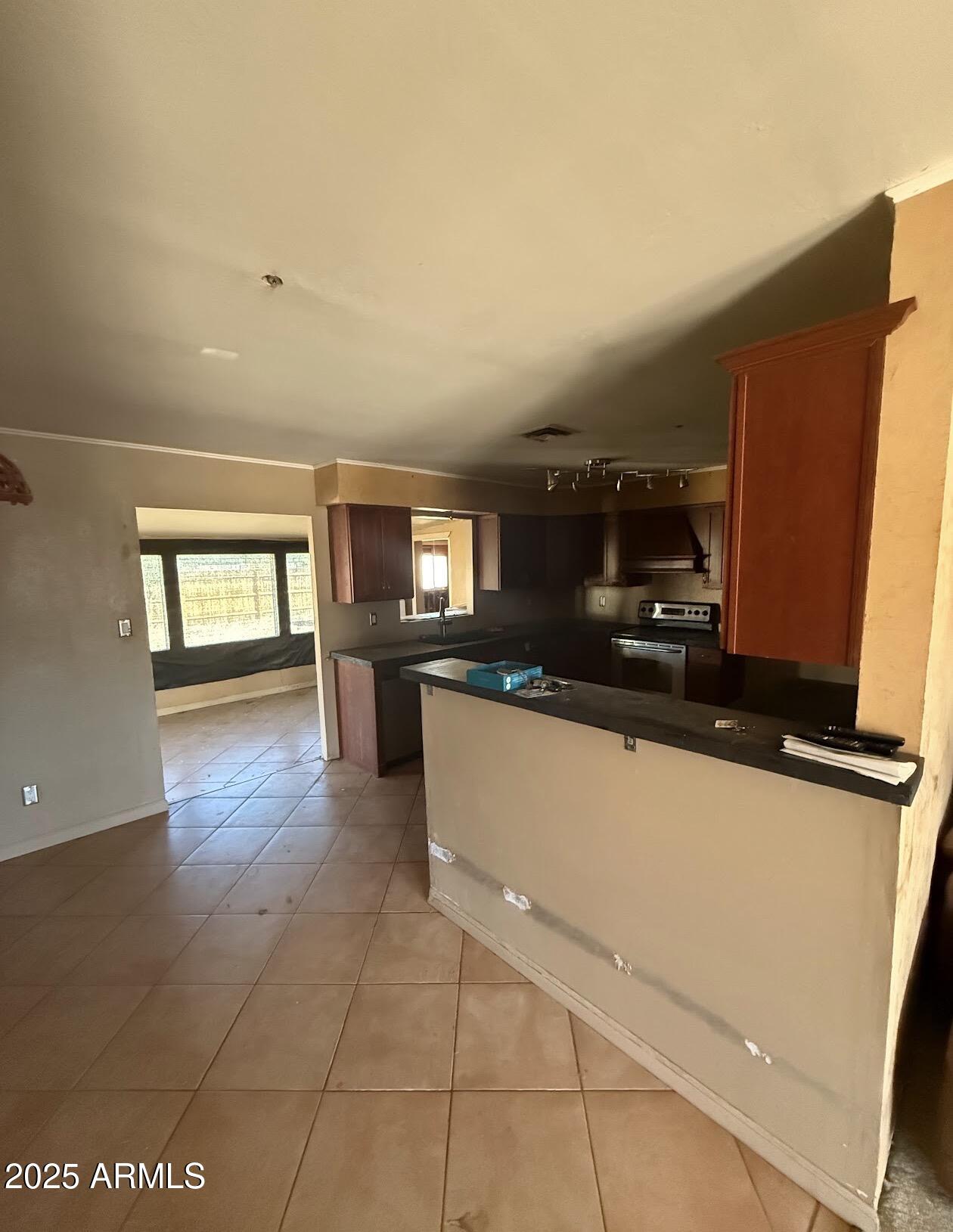 2615 North Yucca Street Chandler, AZ 85224 - Photo 8 of 38 a living room with hard wood floors and a fireplace