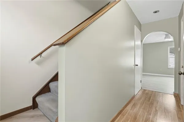 a view of entryway with wooden floor