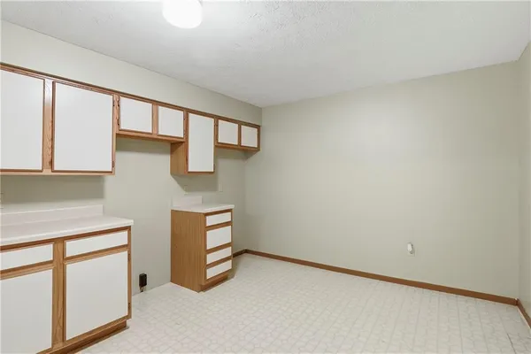 a room with a table and a mirror