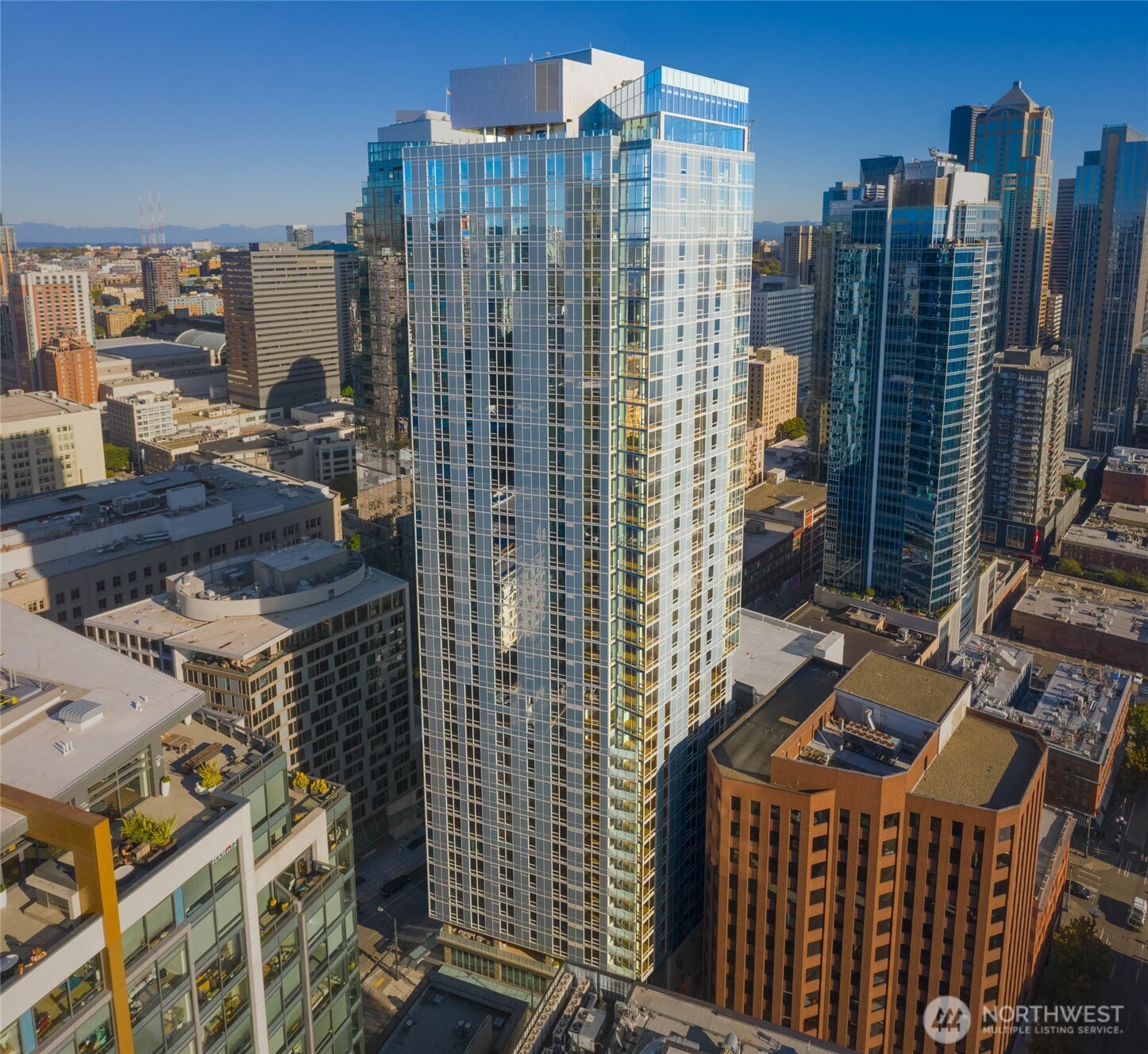 121 Stewart Street, Unit 401 Seattle, WA 98101 - Photo 3 of 29 a view of a city with tall buildings