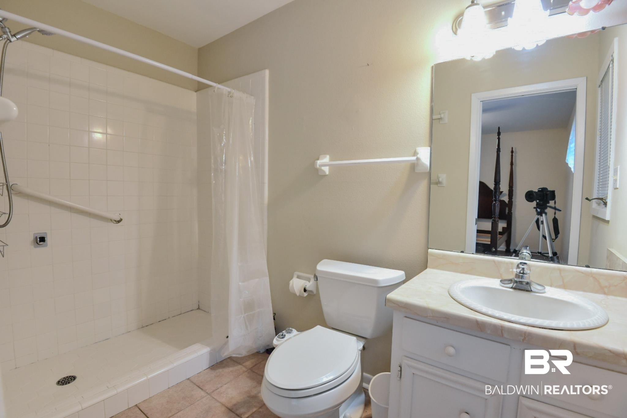90 Paddock Drive Fairhope, AL 36532 - Photo 17 of 23 Full bathroom featuring vanity, a stall shower, and tile patterned floors