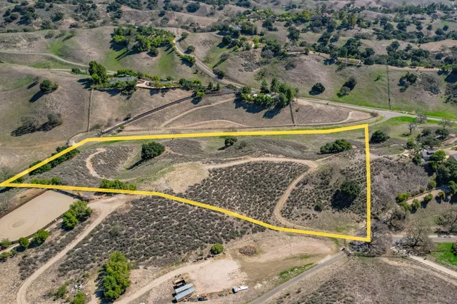 a view of swimming pool with a yard