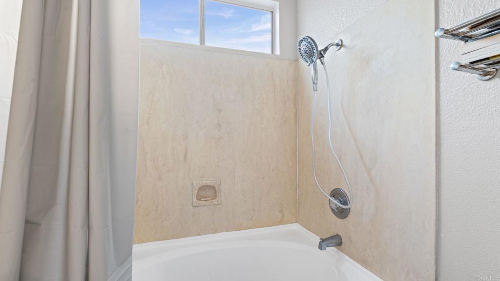 12741 Laurel Street, Unit 34 Lakeside, CA 92040 - Photo 22 of 36 a bathroom with a shower