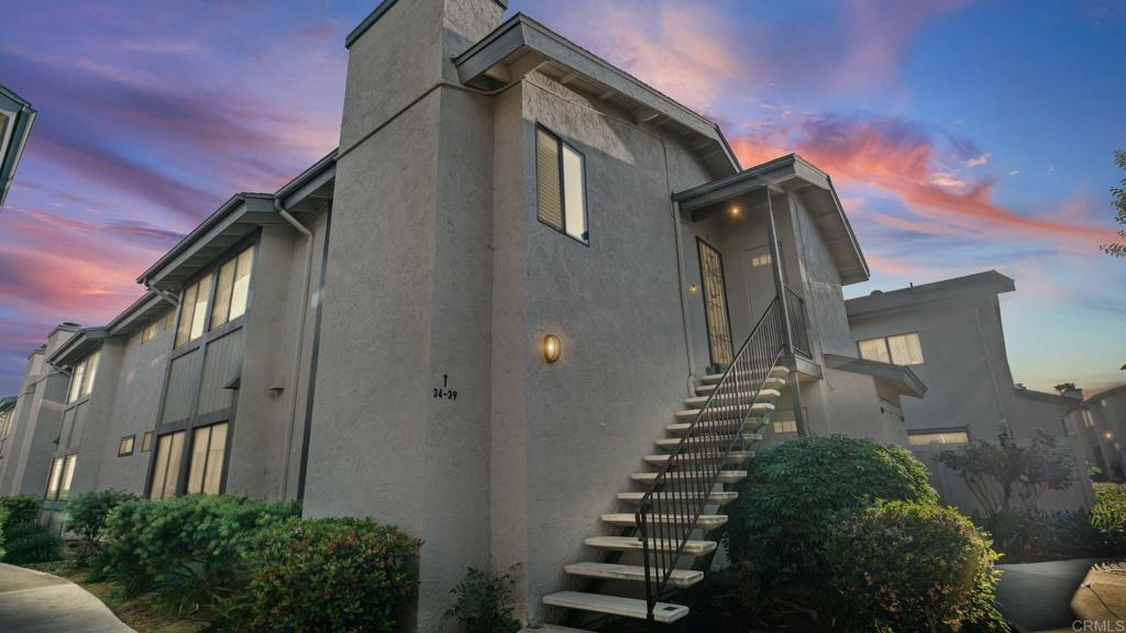12741 Laurel Street, Unit 34 Lakeside, CA 92040 - Photo 32 of 36 a front view of a house with a yard