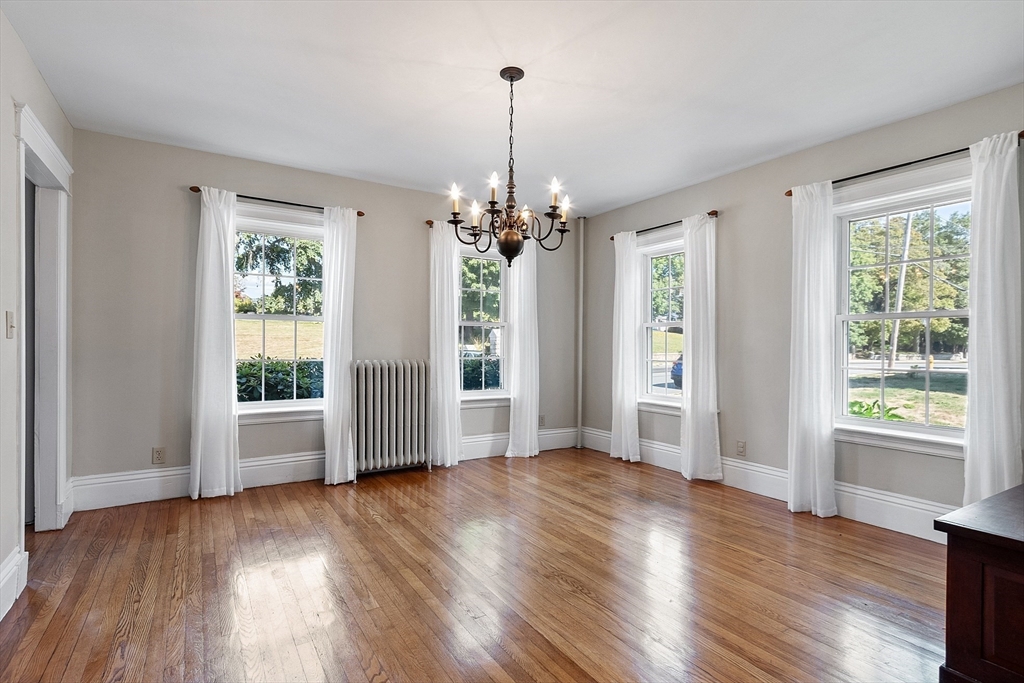 64 Central Street Gardner, MA 01440 - Photo 18 of 42 a view of a room with wooden floors and window
