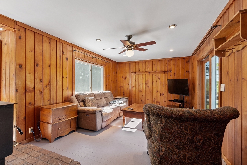 64 Central Street Gardner, MA 01440 - Photo 22 of 42 a living room with furniture and a large window