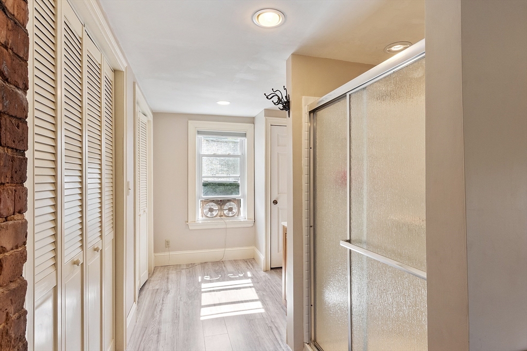64 Central Street Gardner, MA 01440 - Photo 39 of 42 a view of a bathroom with a sink and a mirror